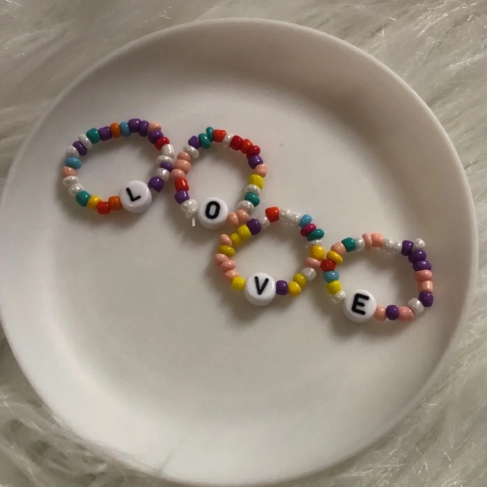 Four beaded LOVE rings